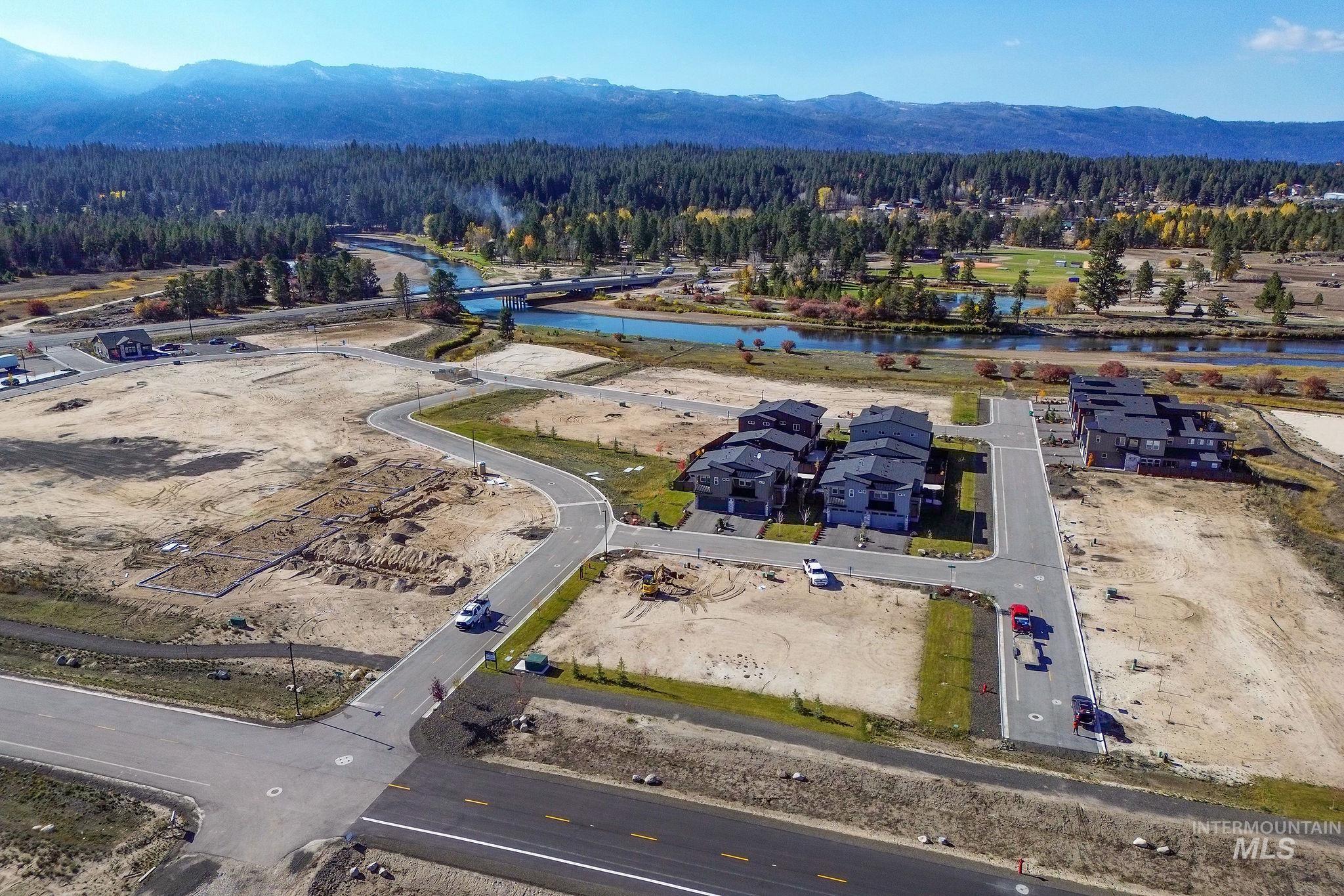 Aerial view of a water and mountain view and a forest
