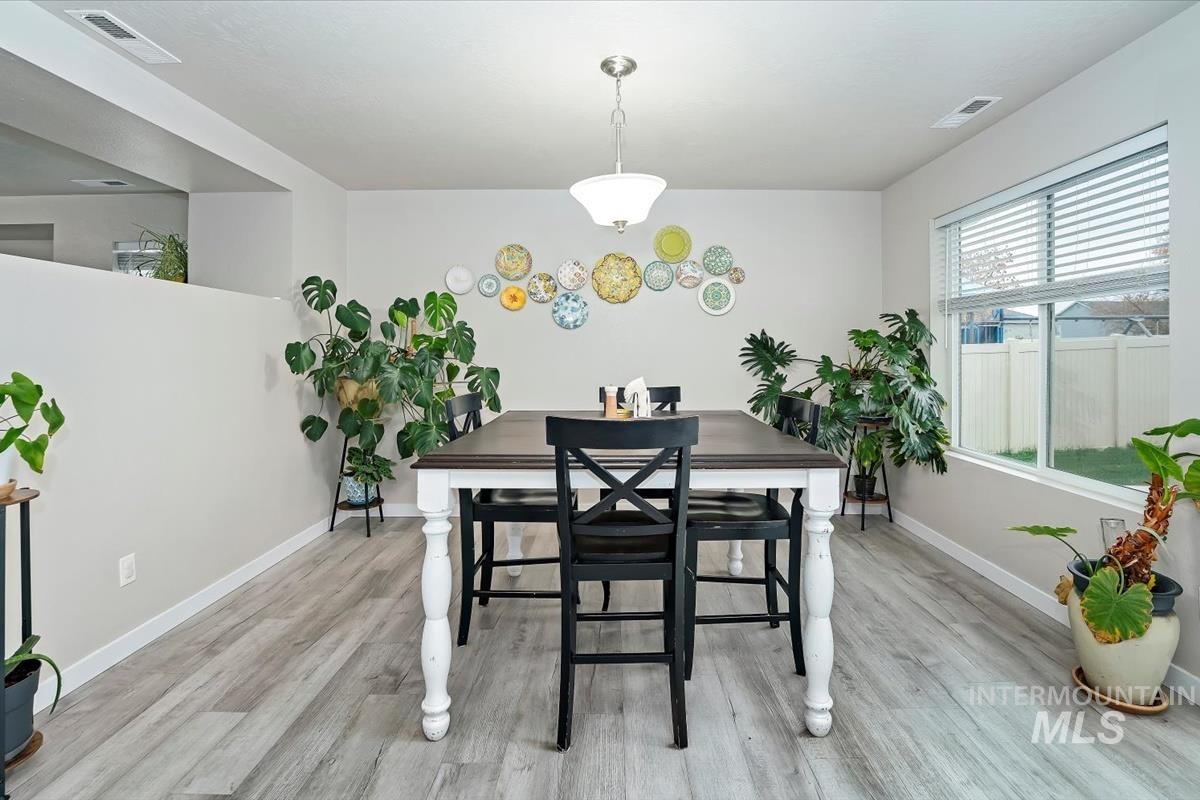 Dining room featuring light wood finished floors