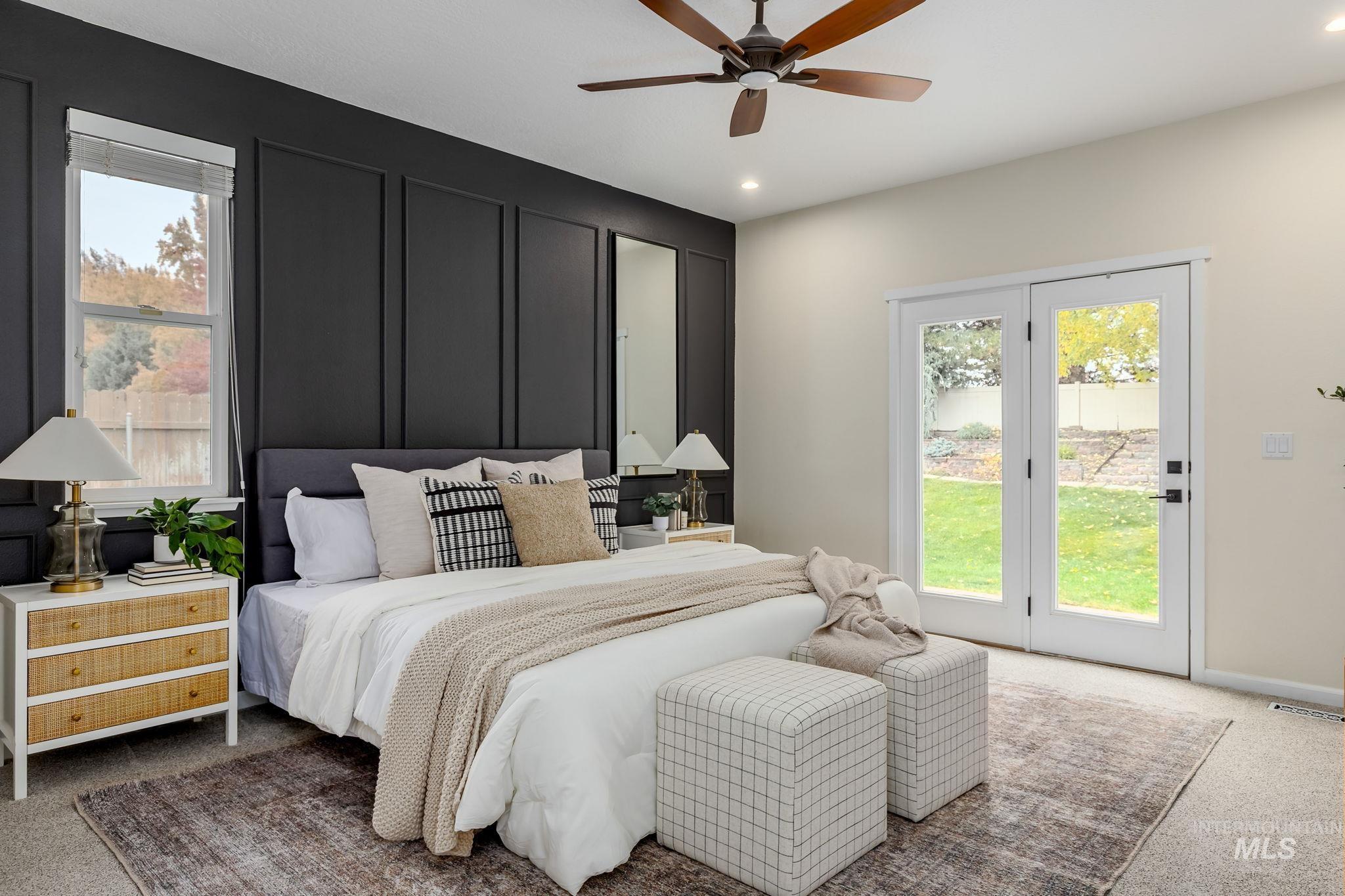 Carpeted bedroom featuring access to outside, ceiling fan, a decorative wall, and recessed lighting