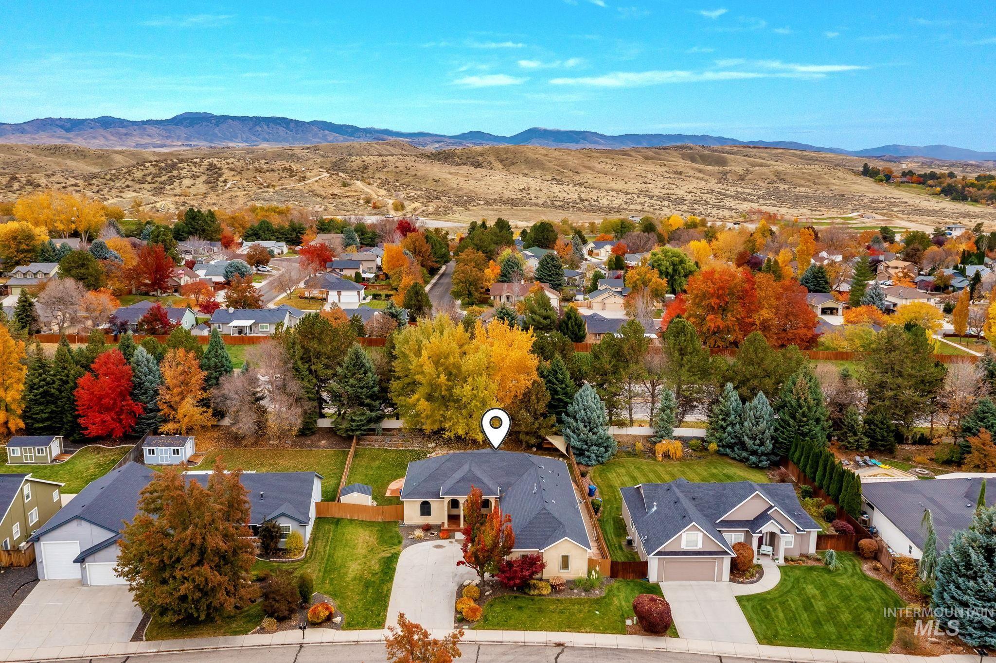 Aerial perspective of suburban area featuring mountains