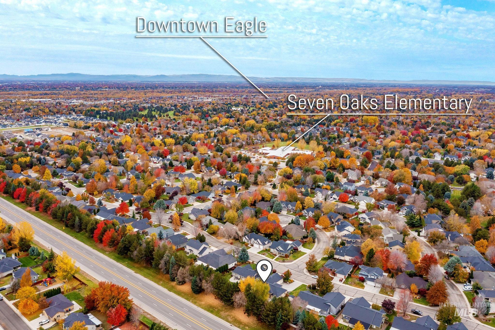 Aerial perspective of suburban area featuring mountains