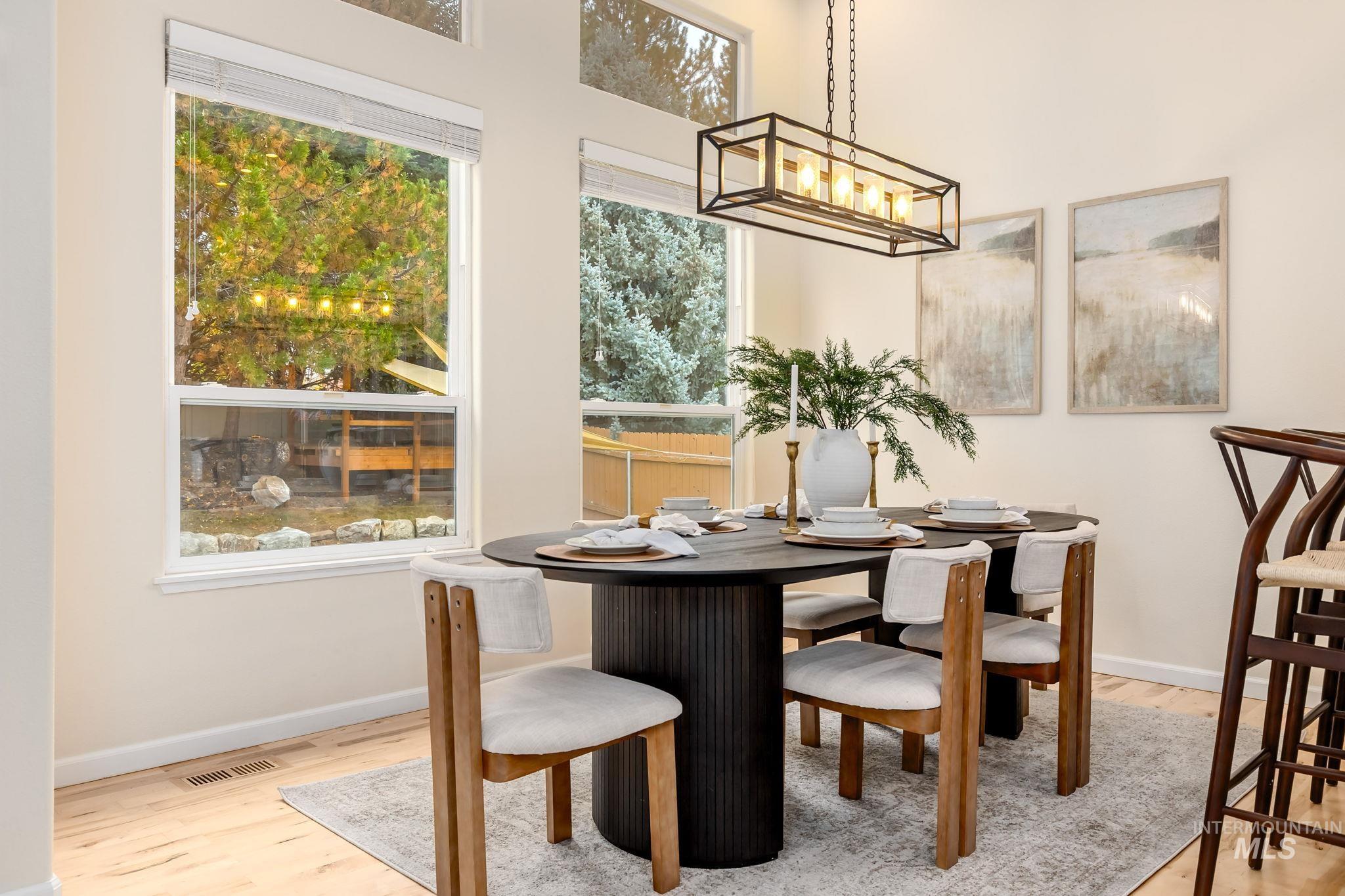 Dining space featuring plenty of natural light and light wood-style flooring