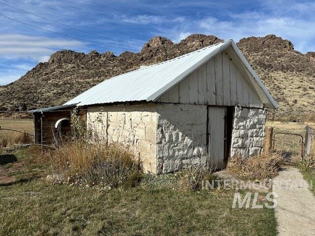 View of outdoor structure featuring a mountain view