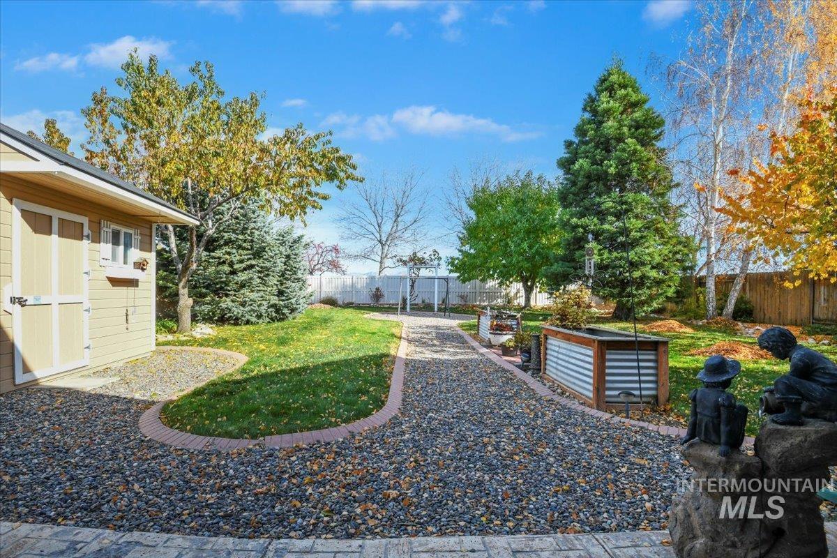 View of fenced backyard