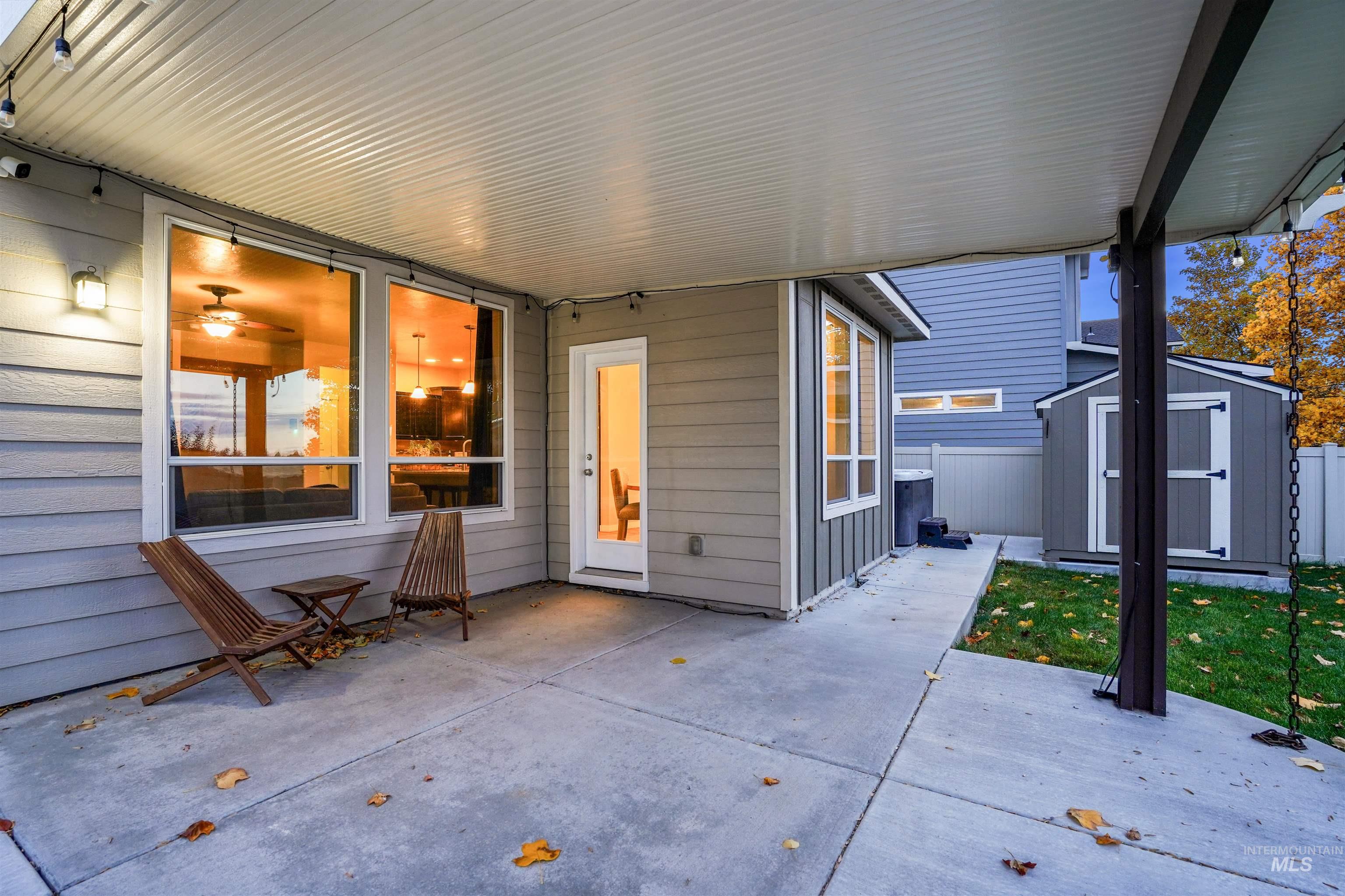 View of patio / terrace featuring a storage shed
