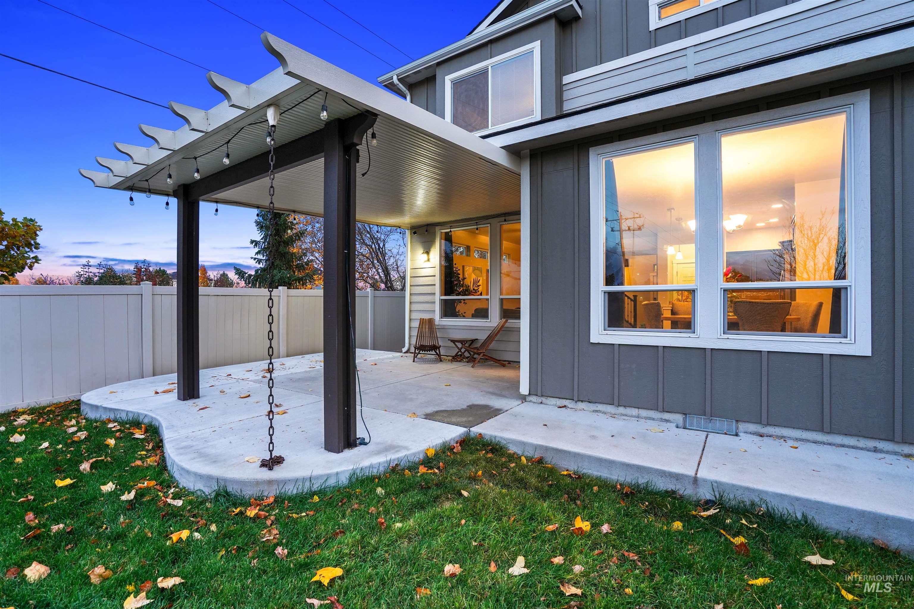 Patio terrace at dusk featuring a patio