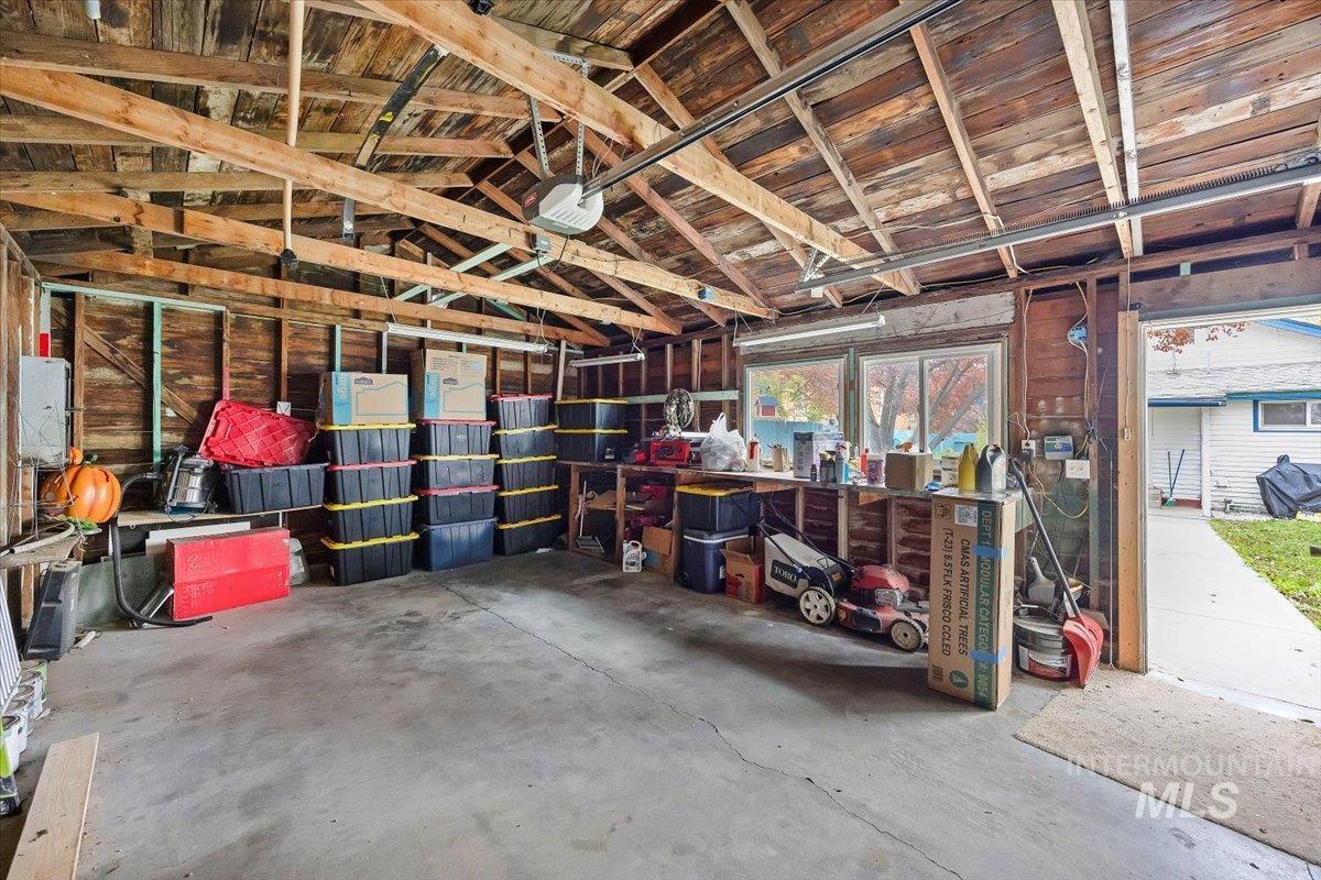 Garage featuring a garage door opener