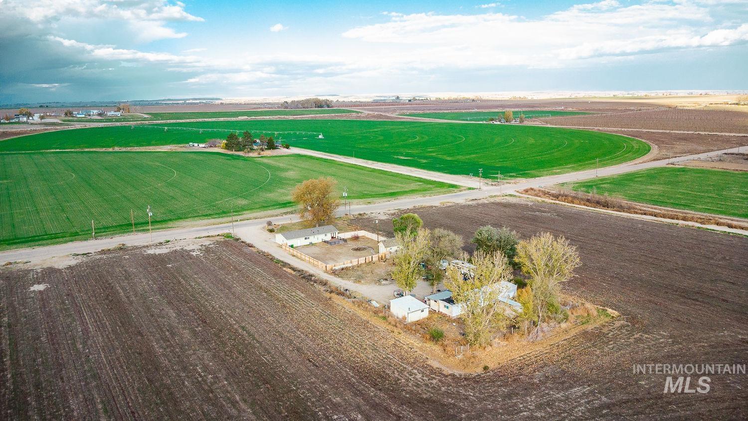 View of rural area featuring large plots for crops