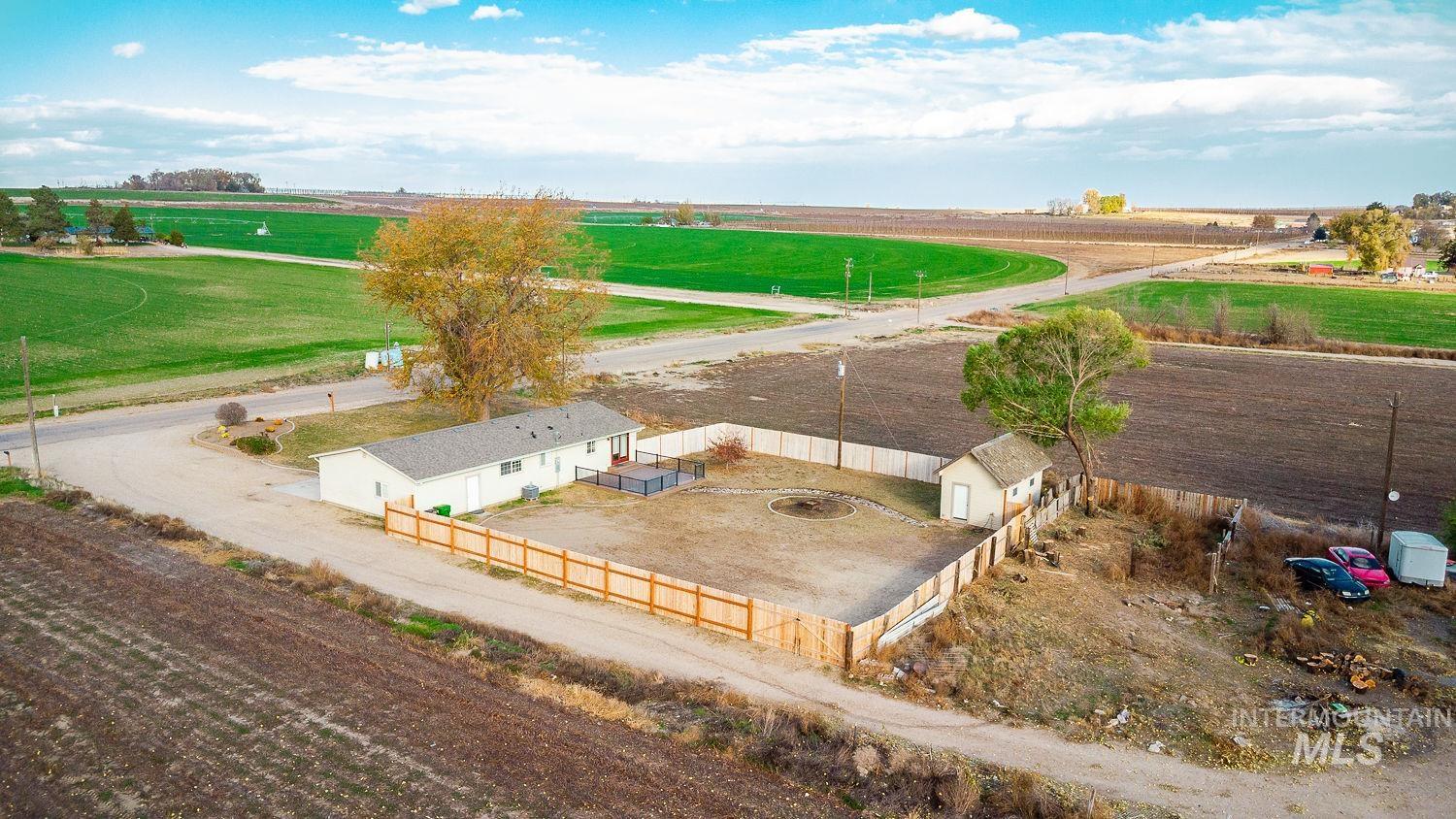 Overview of rural landscape with rows of crops
