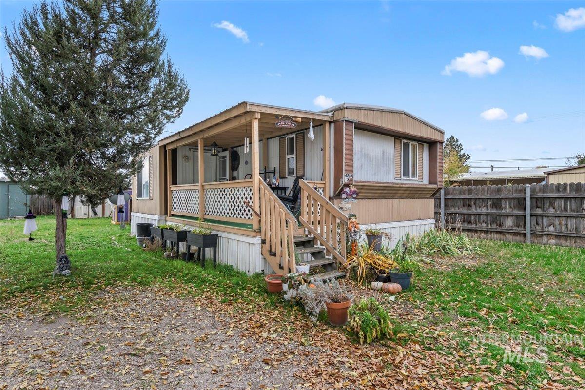 View of front of home featuring covered porch