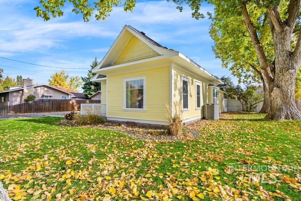 View of side of property with a fenced backyard