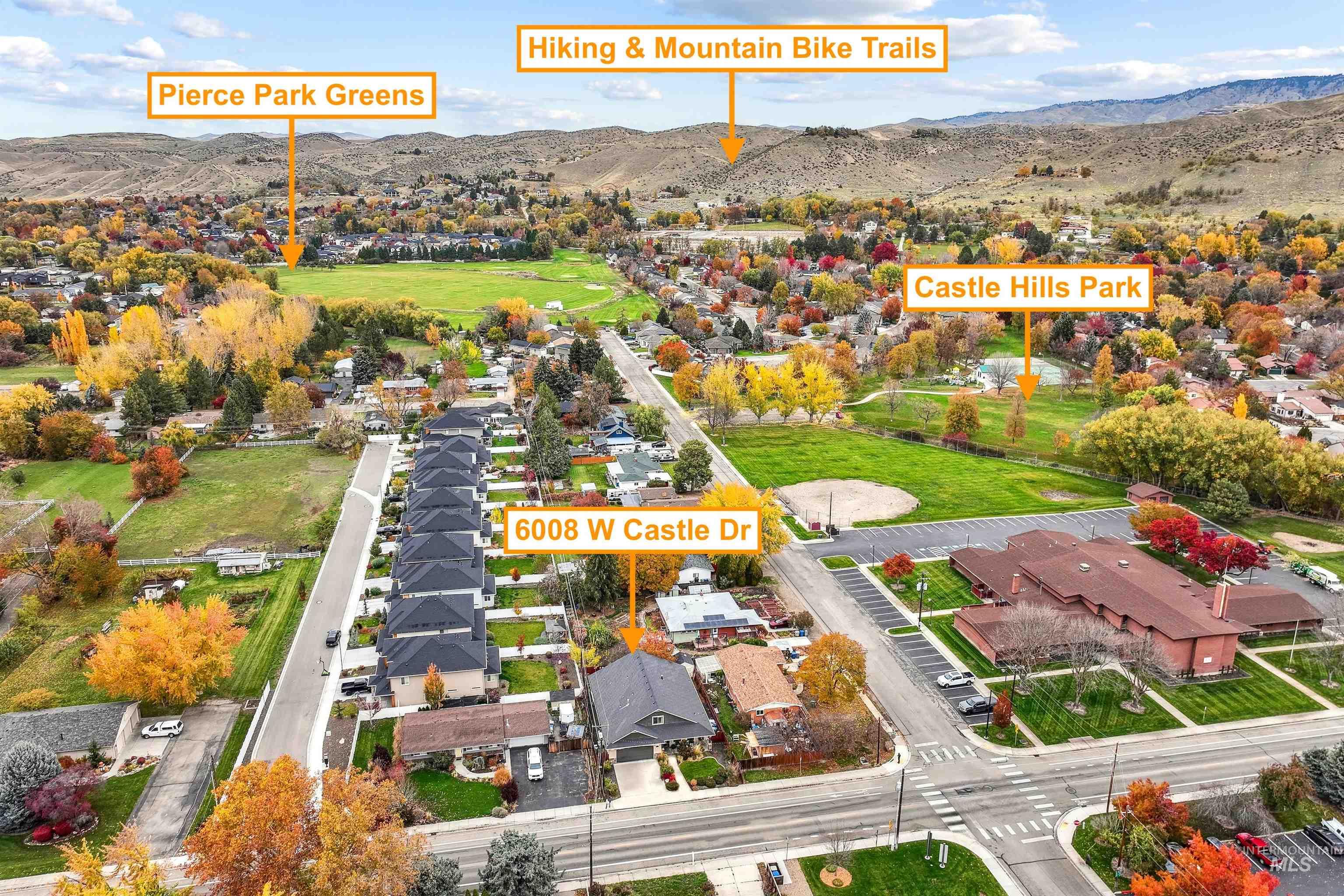 Aerial view of residential area with a mountainous background