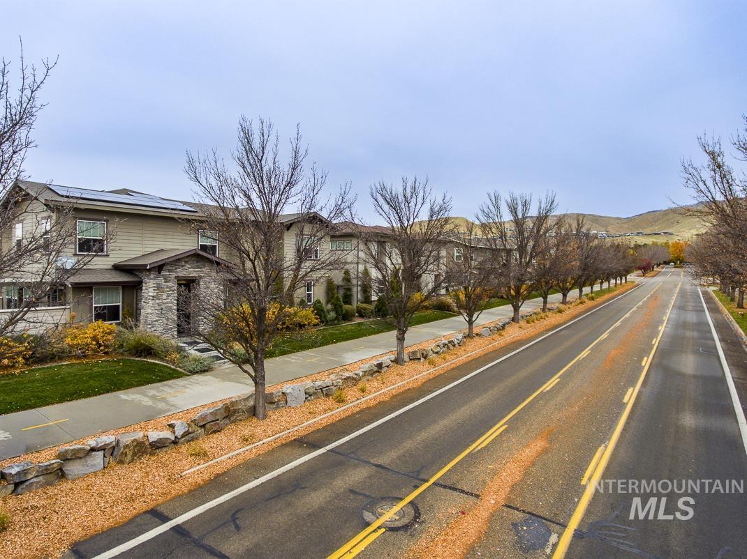 View of asphalt street with a mountain view