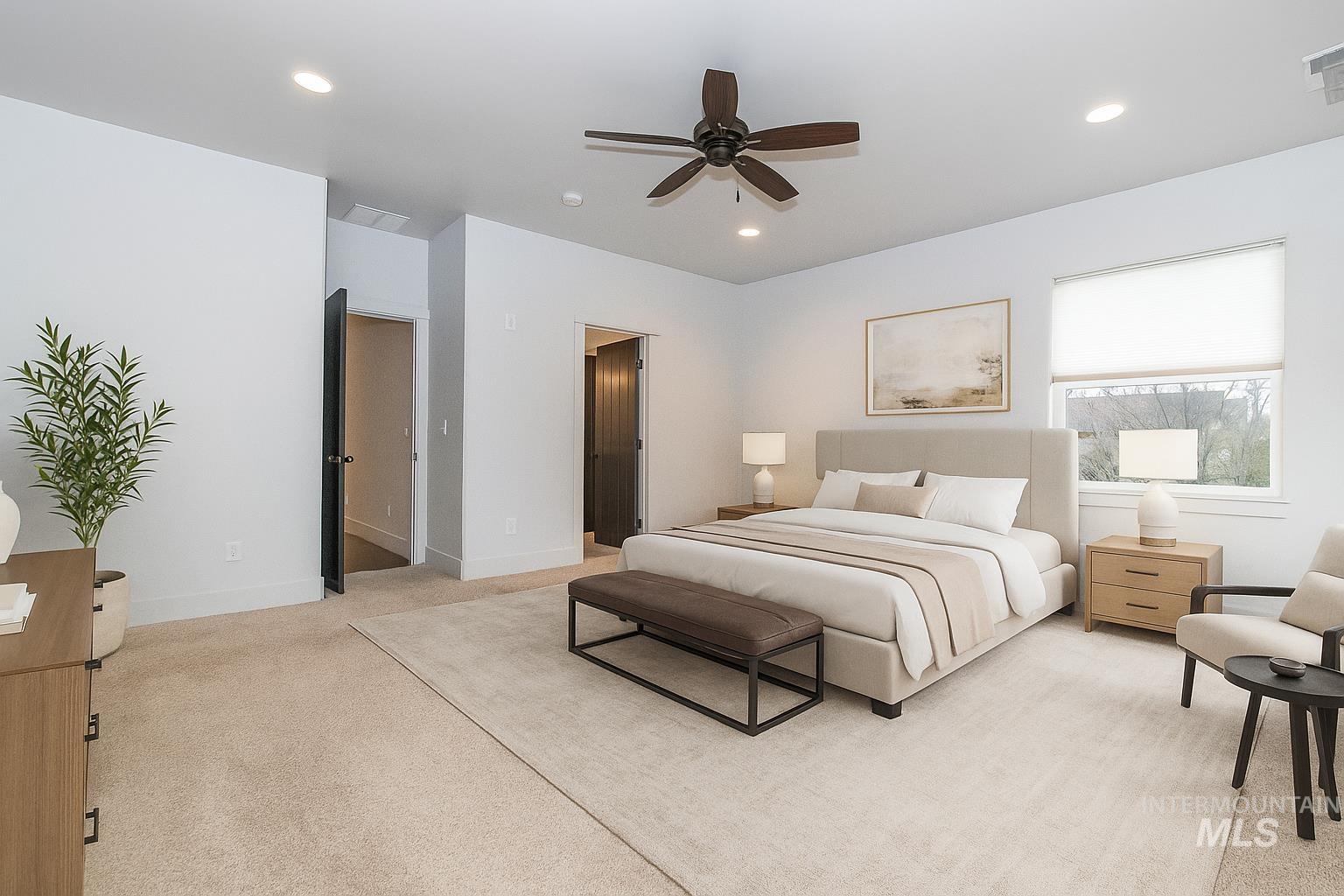 Bedroom featuring light colored carpet, a ceiling fan, and recessed lighting