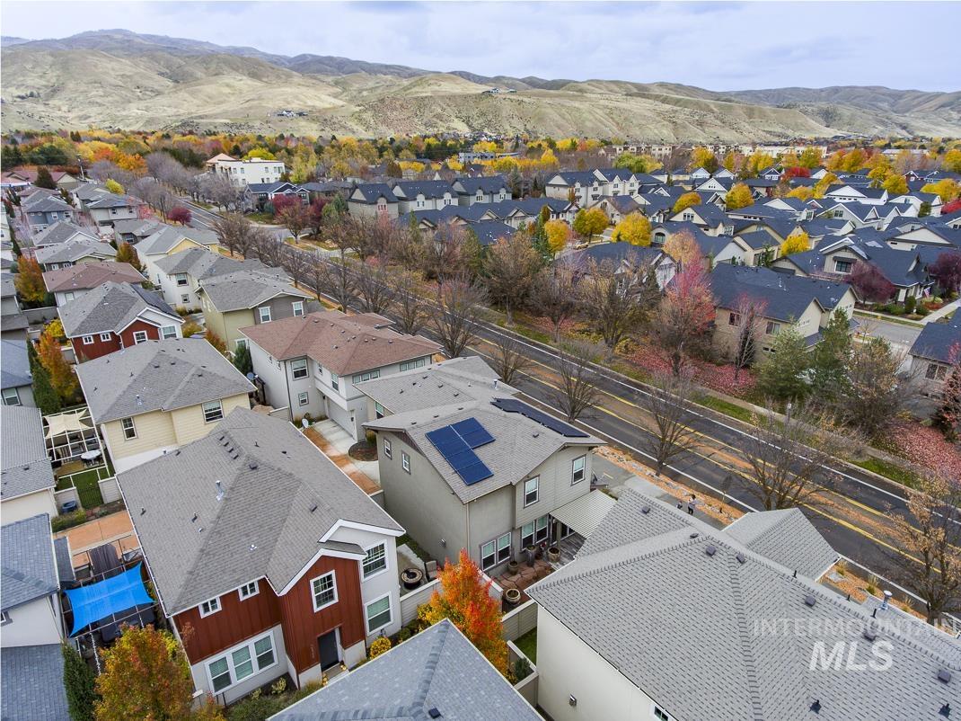 Aerial perspective of suburban area with mountains