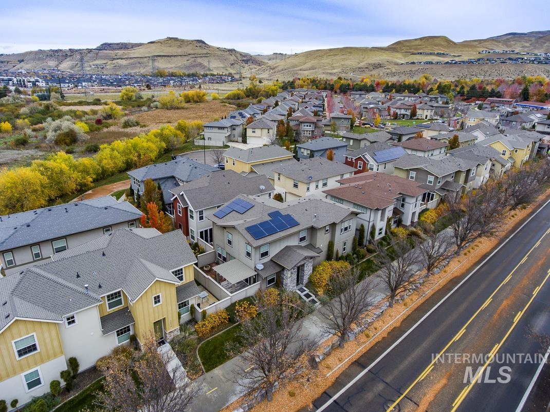 Aerial perspective of suburban area featuring mountains