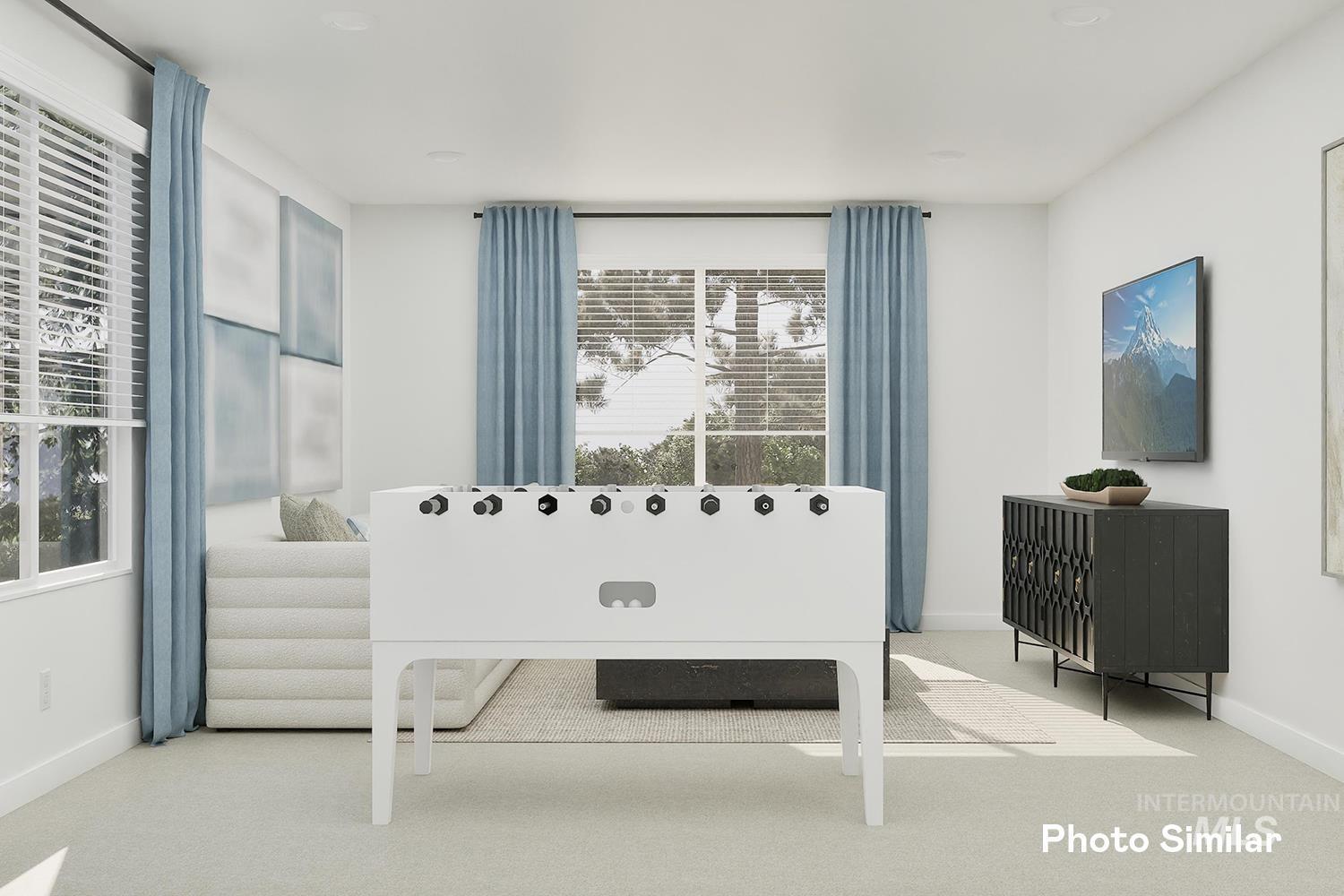 Doorway with baseboards and carpet floors