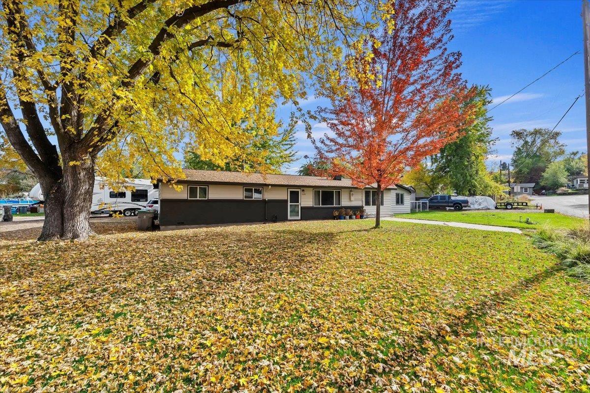 Single story home featuring a front yard