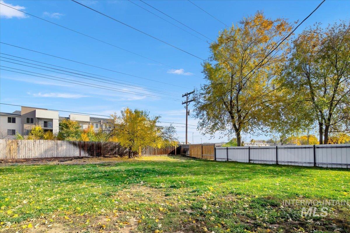 View of fenced backyard