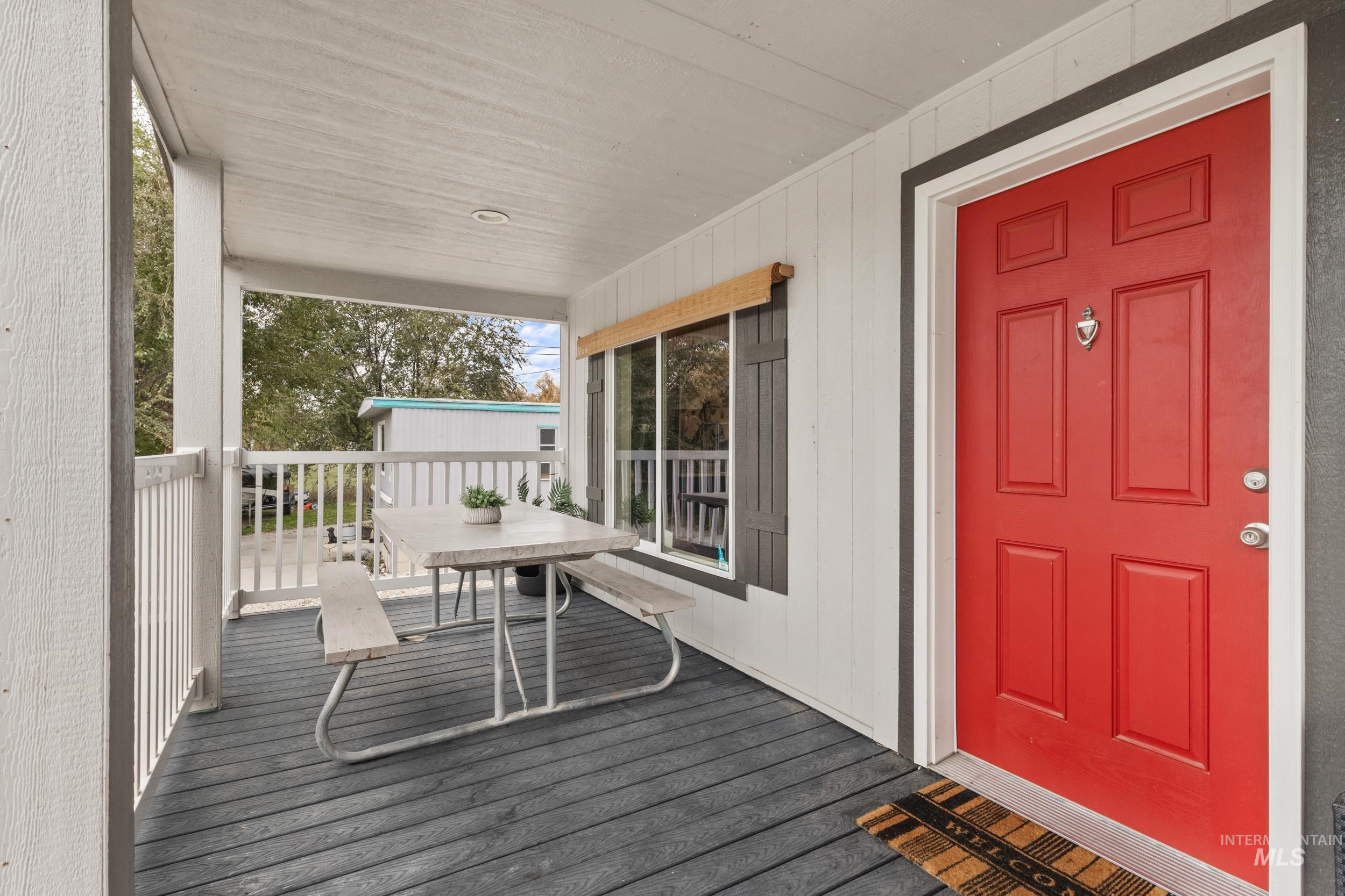 Wooden terrace with outdoor dining area