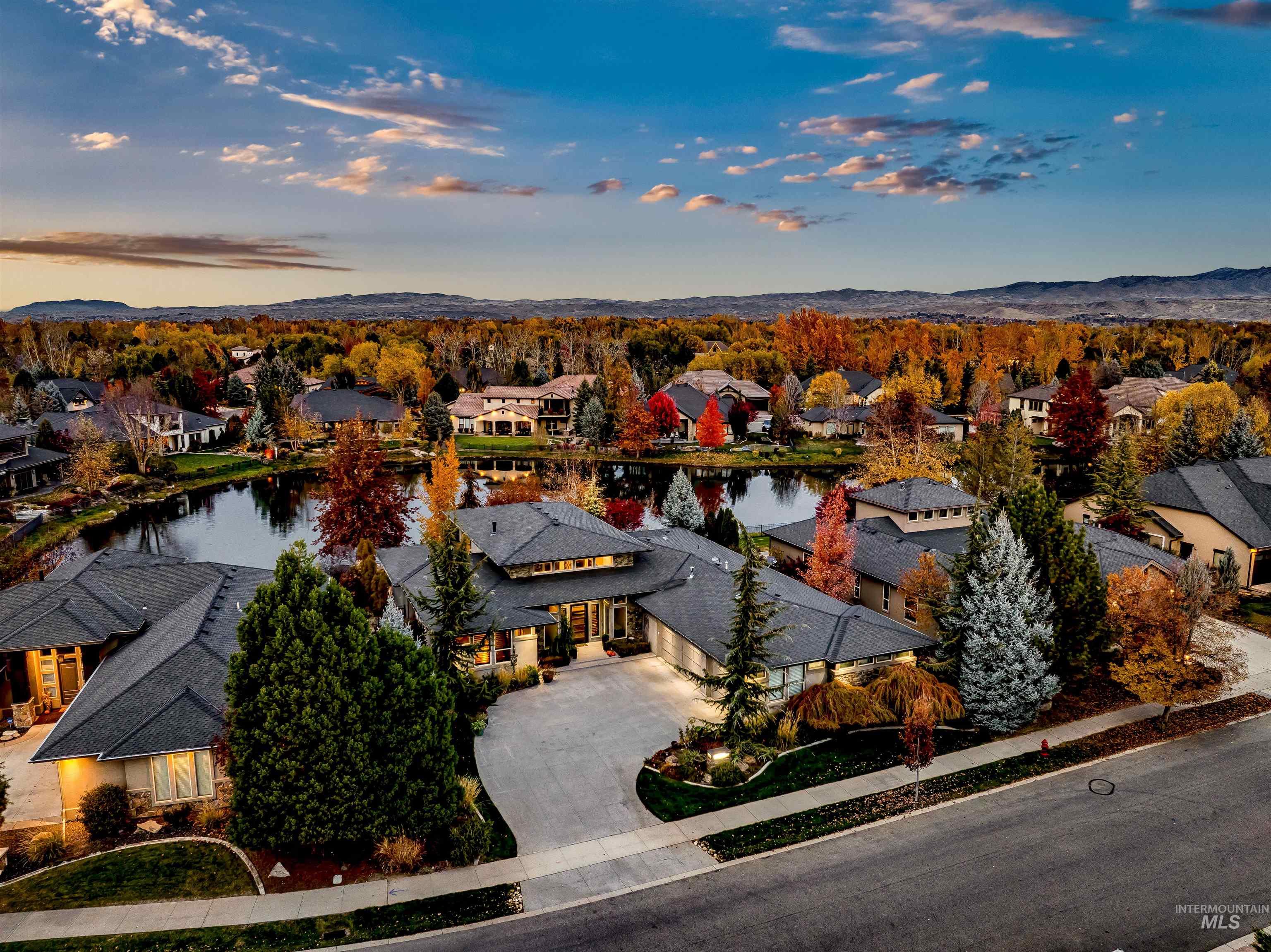 Aerial view at dusk of a residential view and a water view