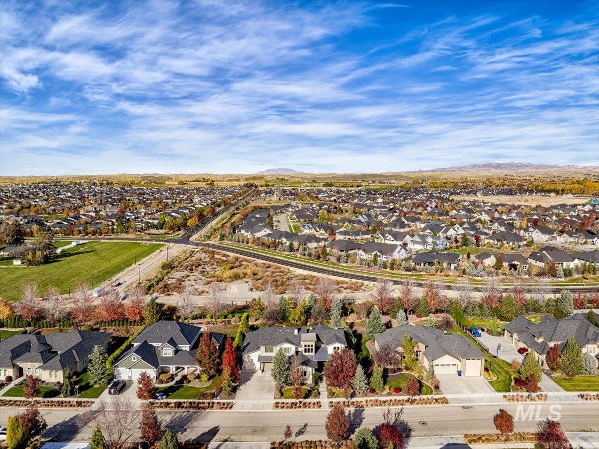 View of property location with nearby suburban area