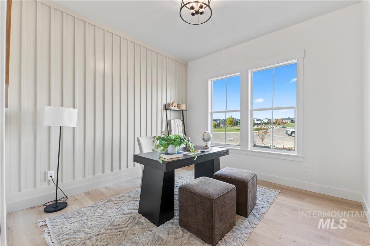 Office space with light wood-type flooring
