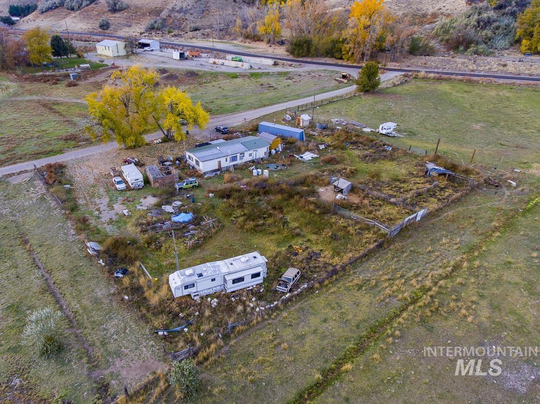 Aerial view of property and surrounding area with rural landscape