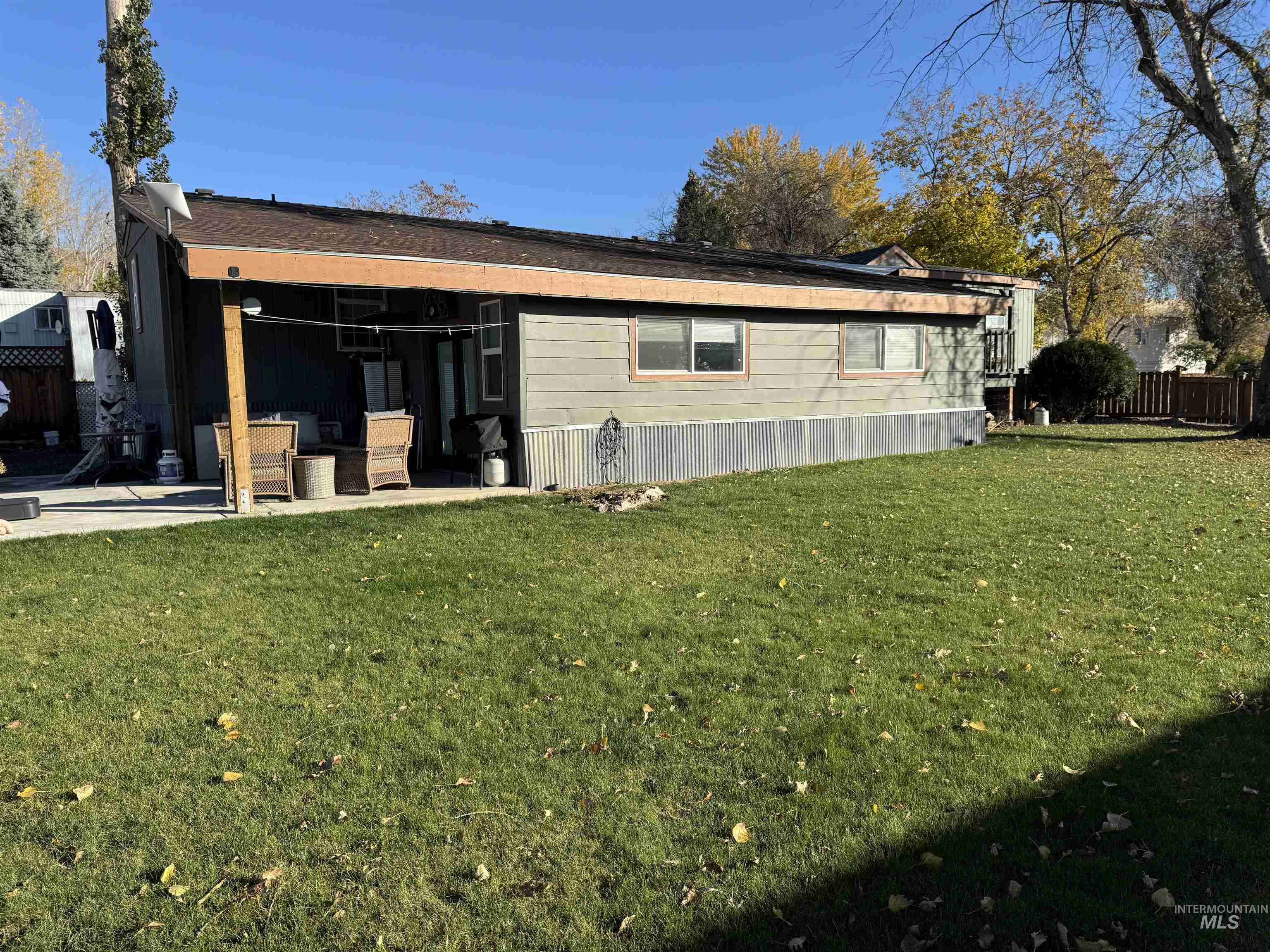Back of property with a patio area