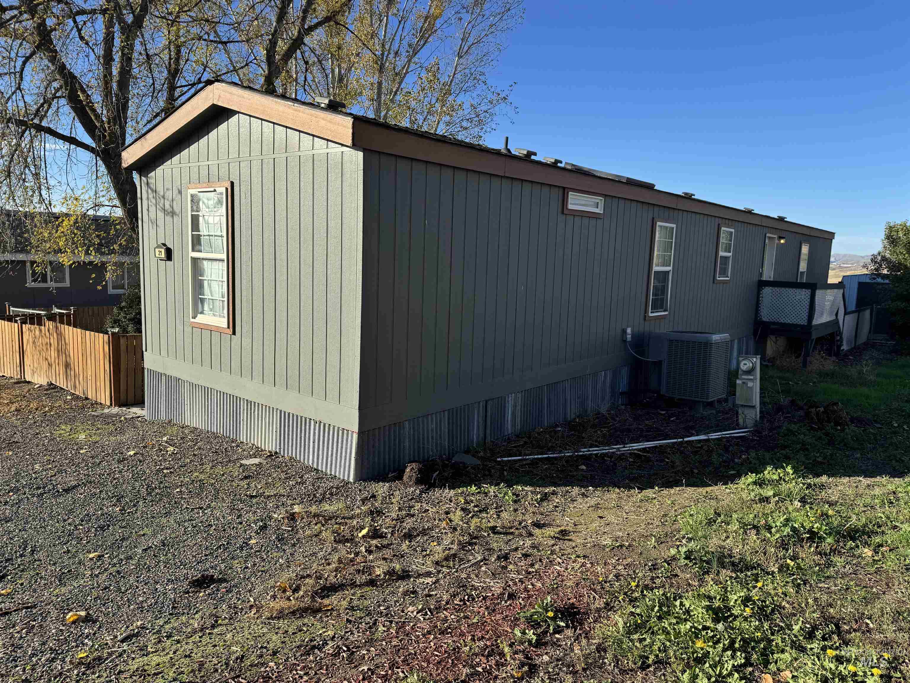 View of property exterior with a cooling unit