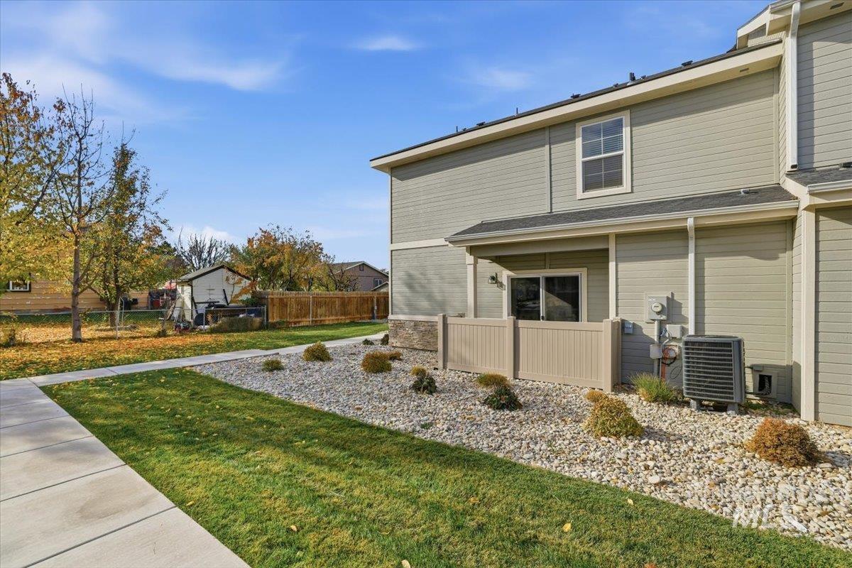 View of property exterior with a central air condition unit