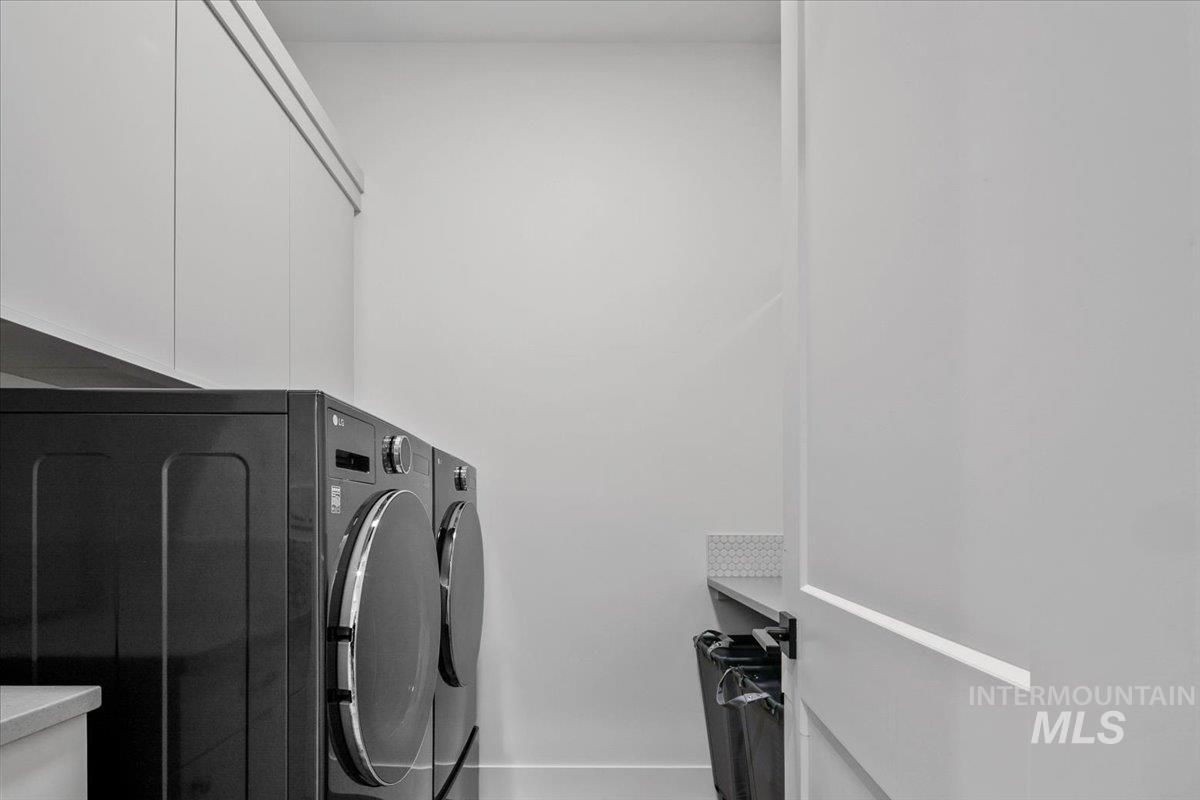 Laundry area with washing machine and dryer
