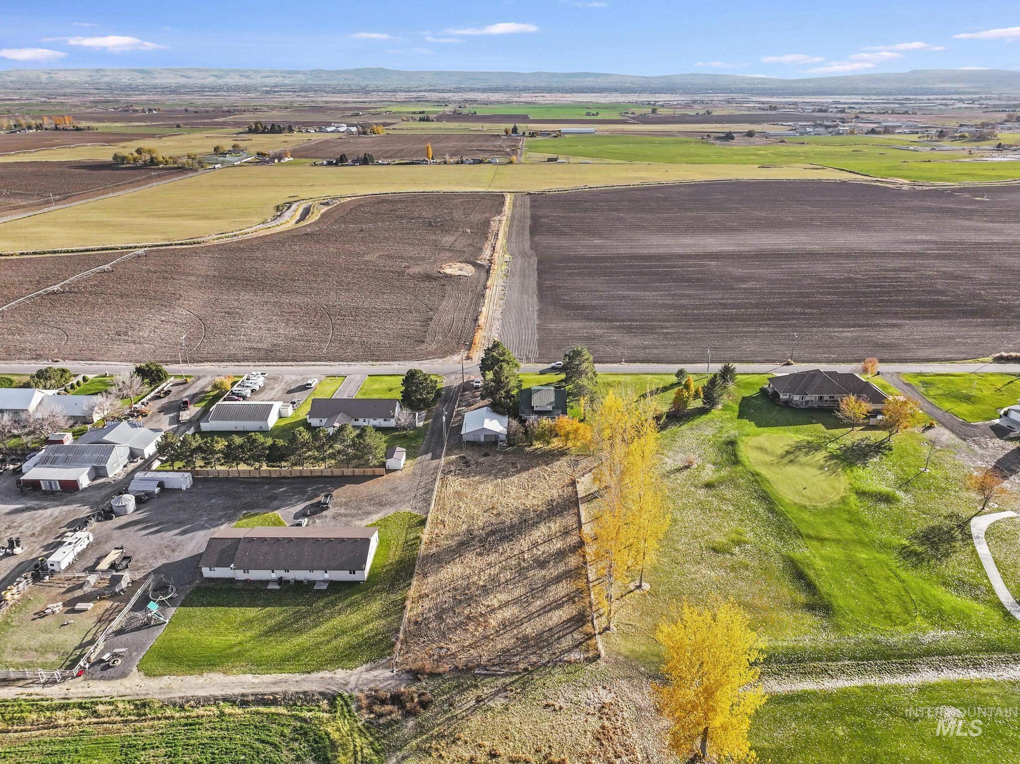 Aerial view of property's location featuring rural landscape