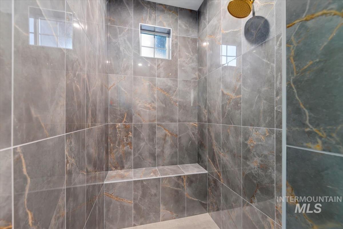 Bathroom with a tile shower