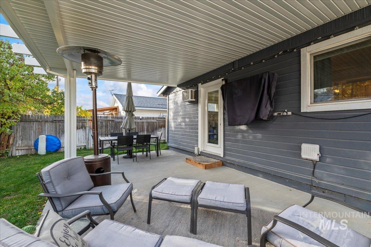 View of patio featuring outdoor dining area