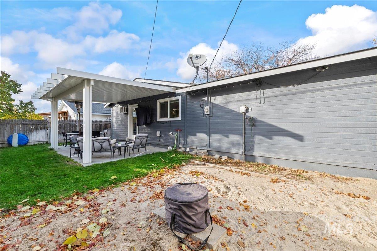 Back of property featuring a patio