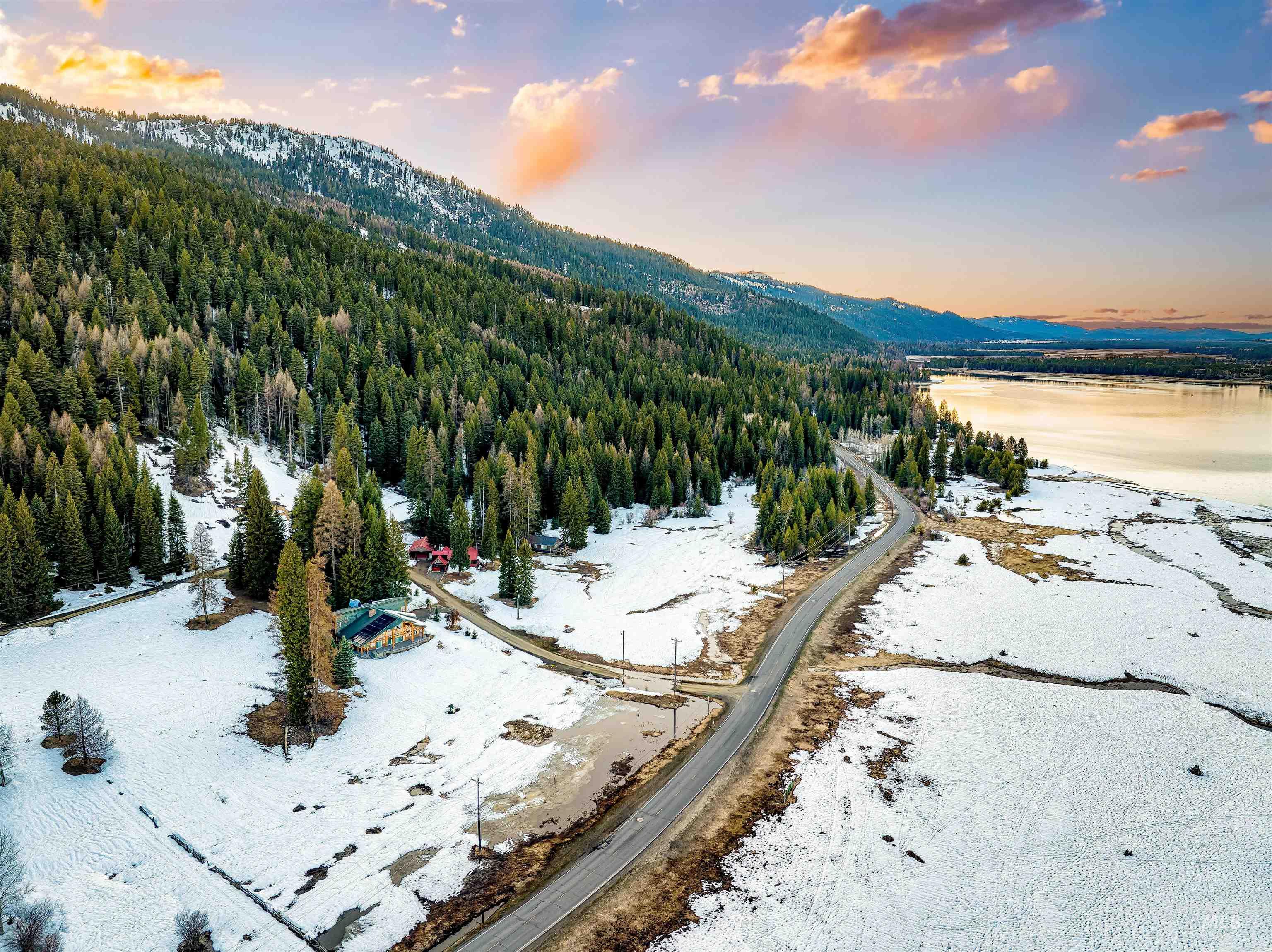 Aerial view at dusk of a water and mountain view
