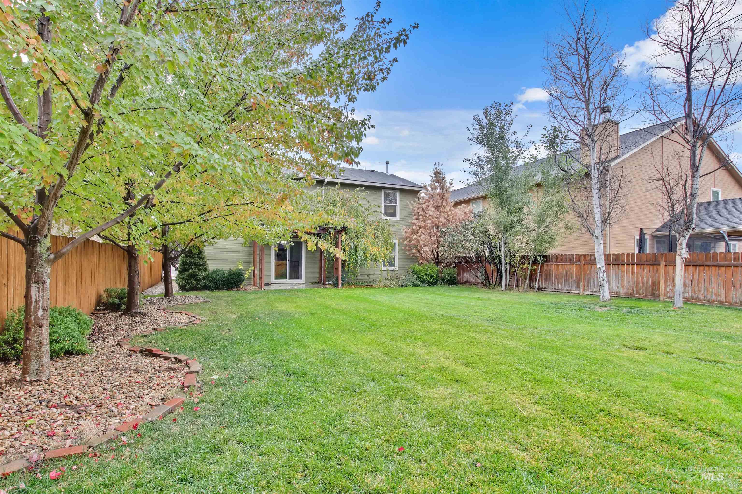 View of fenced backyard