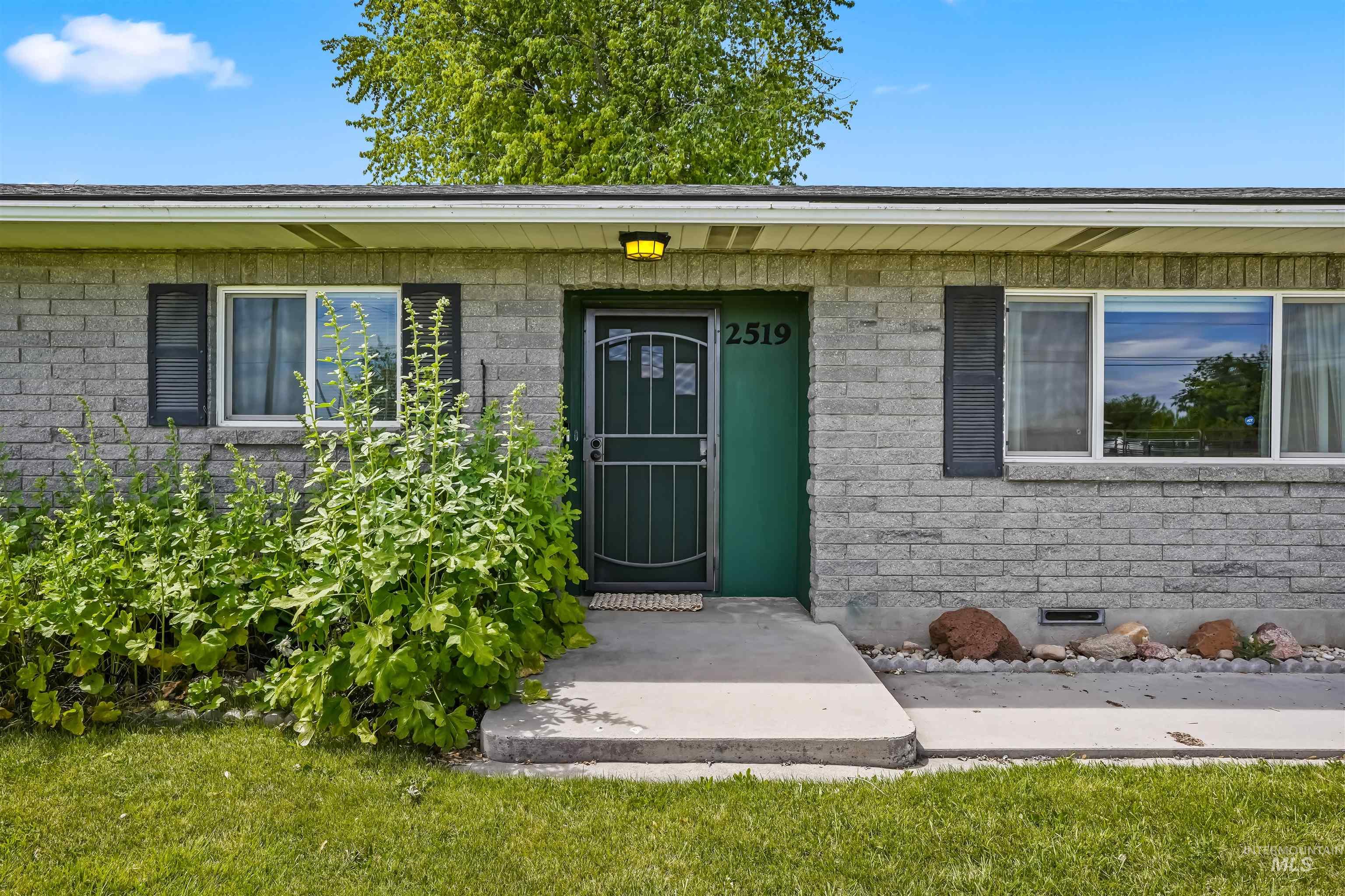 View of exterior entry featuring crawl space