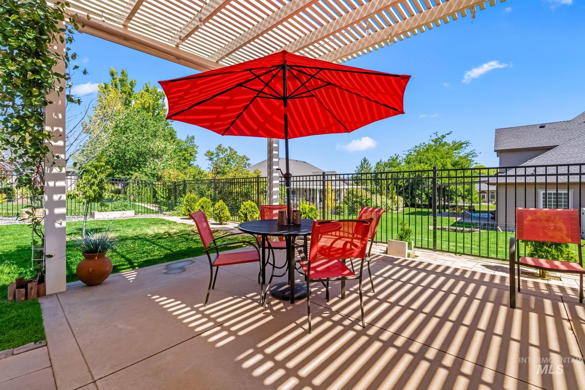 View of patio / terrace with outdoor dining area and a pergola