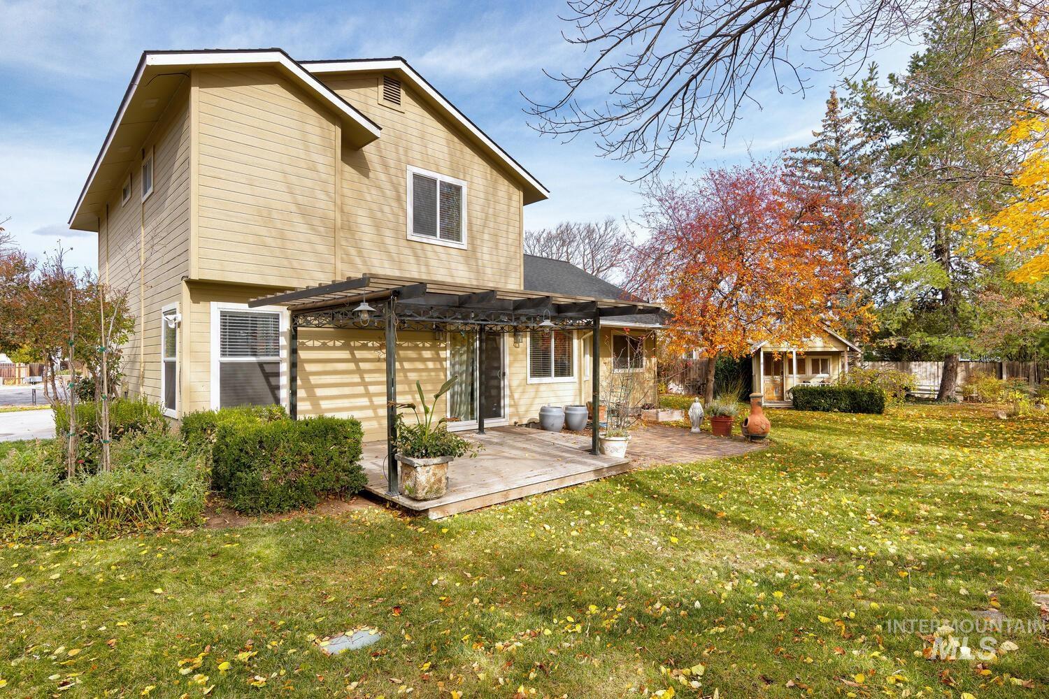 Back of property featuring a deck