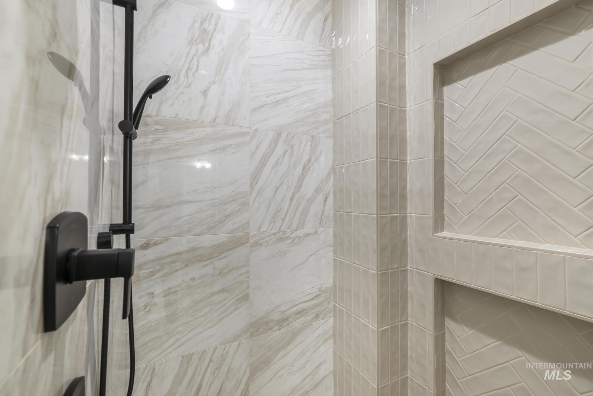 Bathroom view of tiled shower