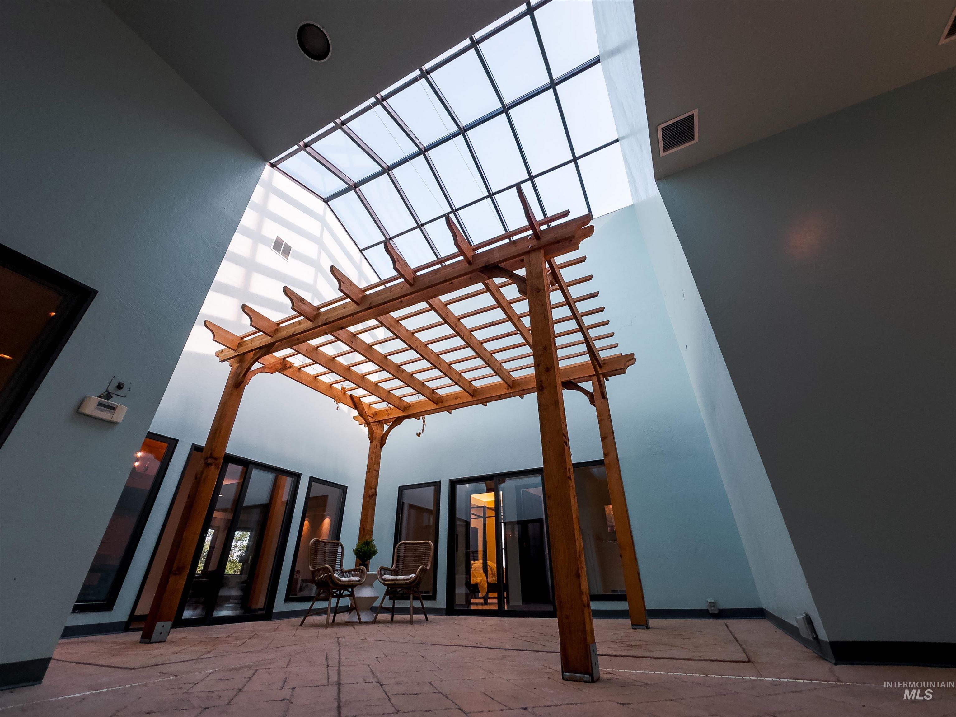 View of patio with a pergola