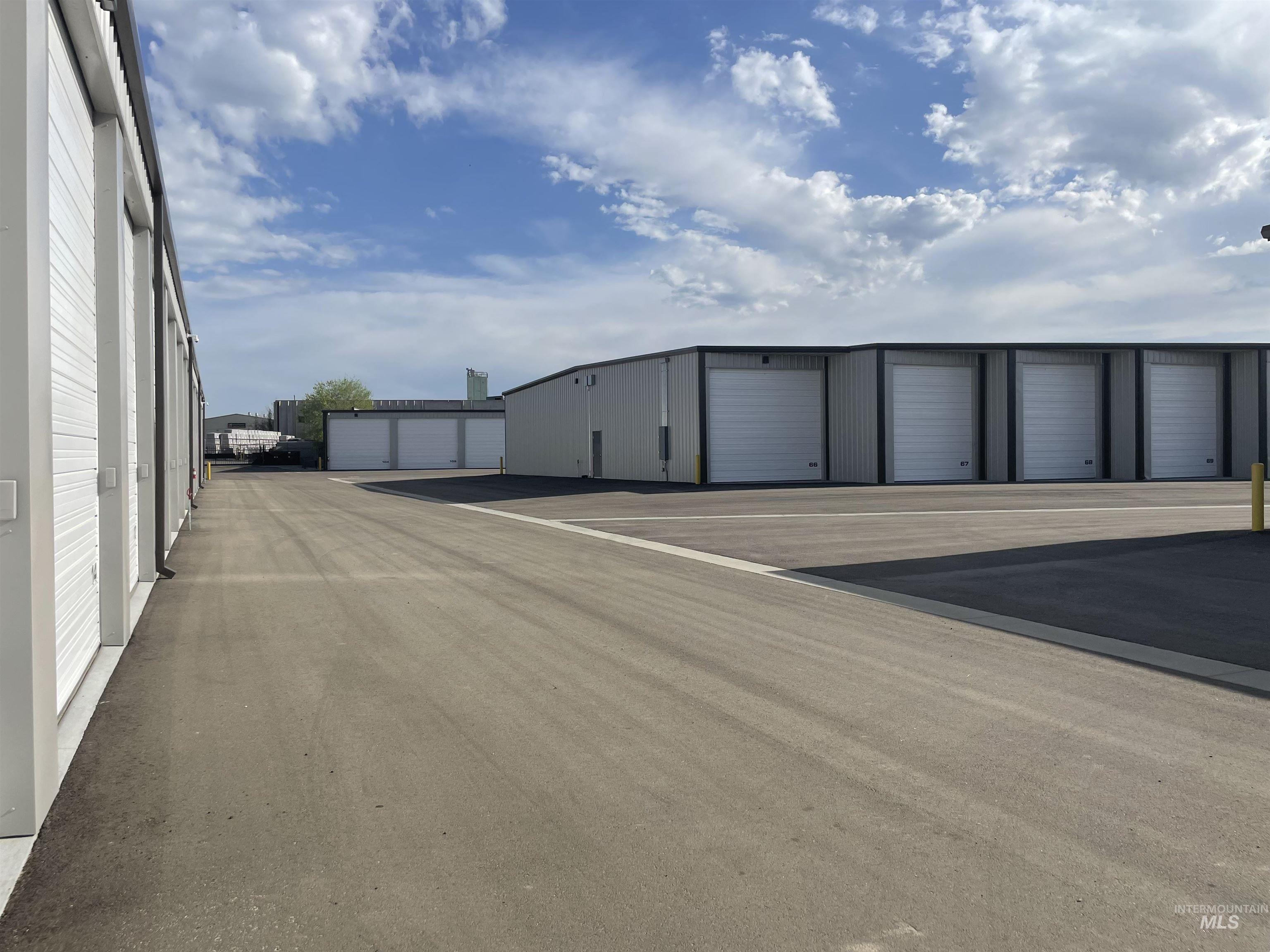 View of road featuring community garages