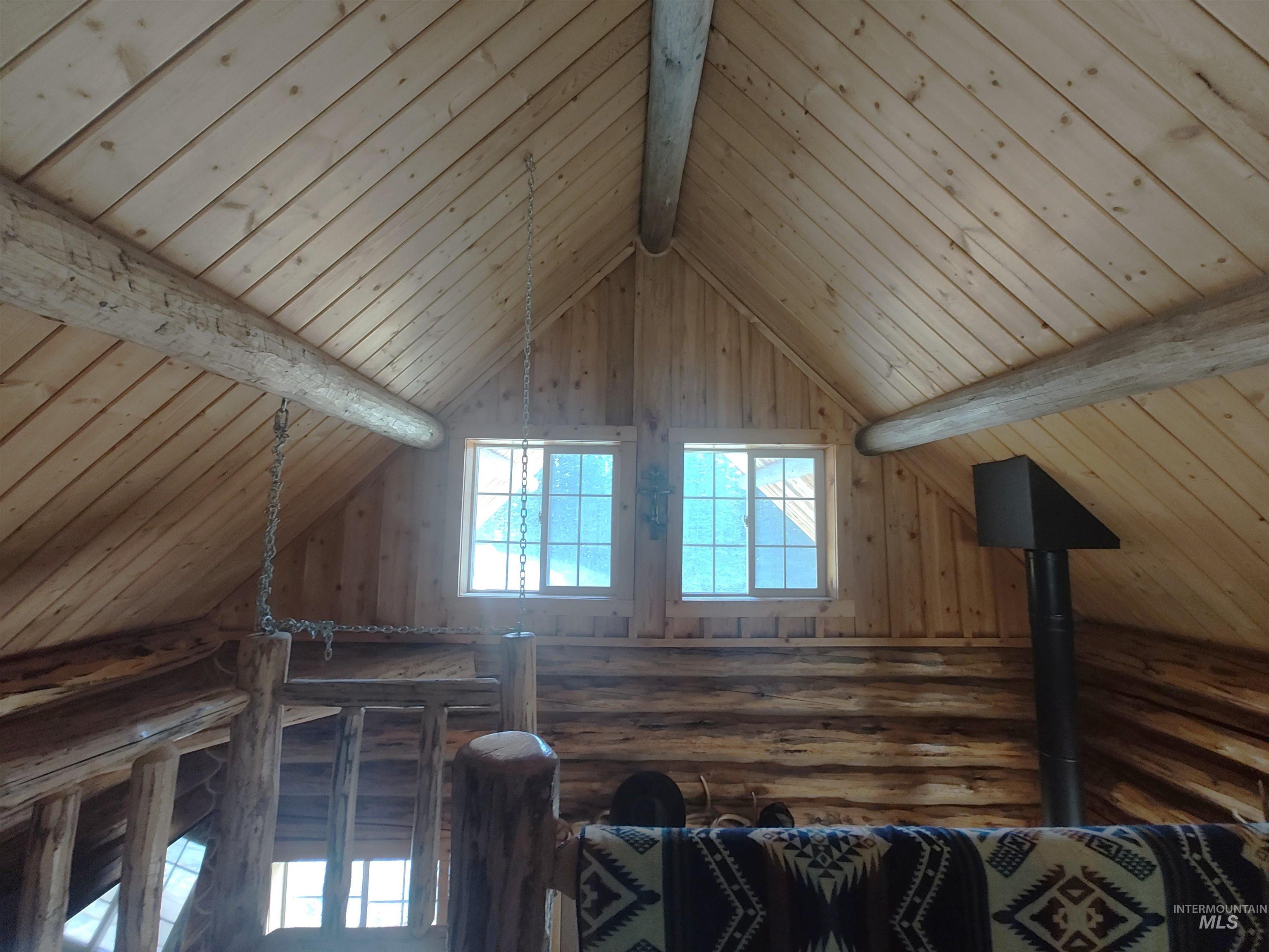 Attic featuring plenty of natural light