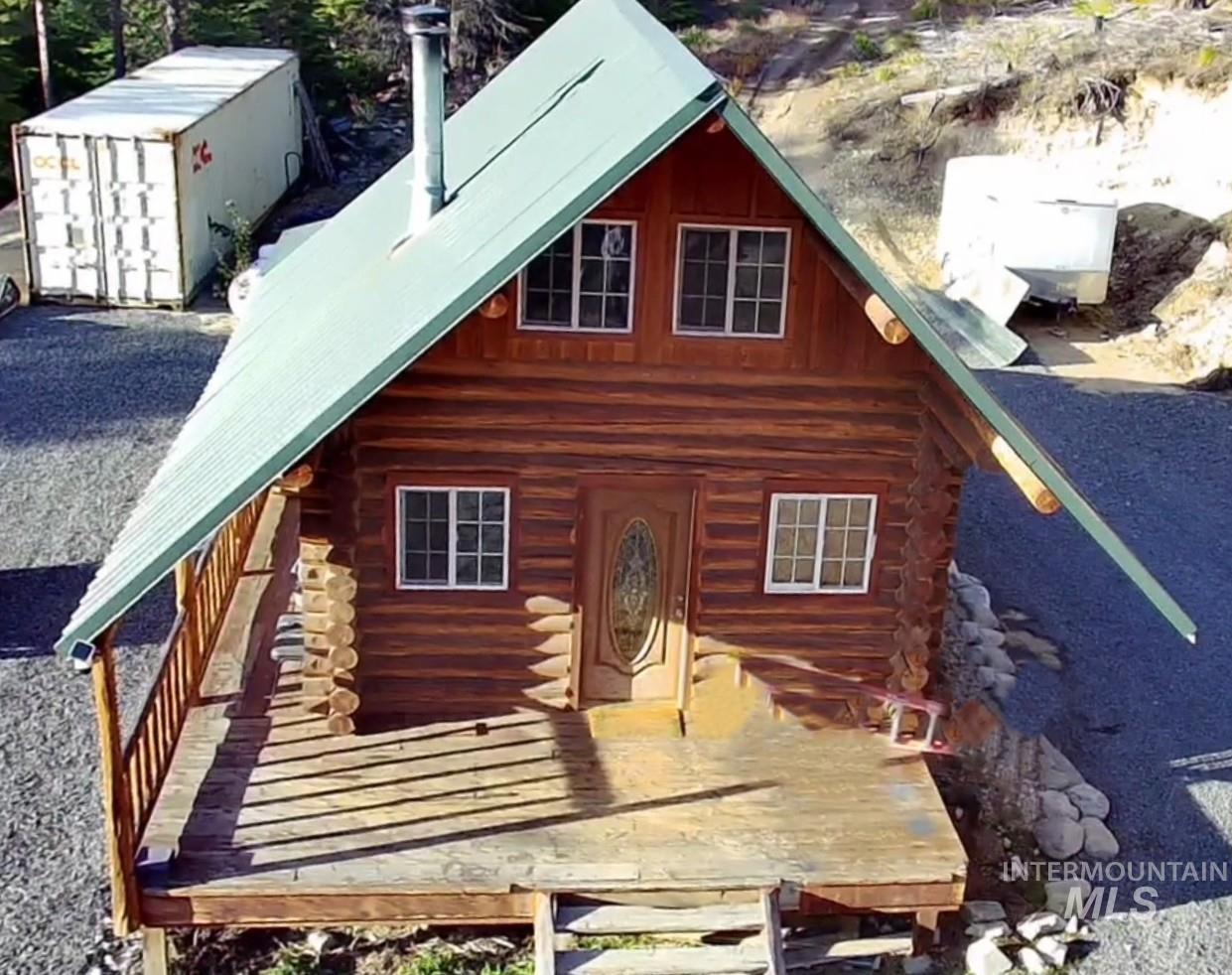 View of front of property featuring log exterior