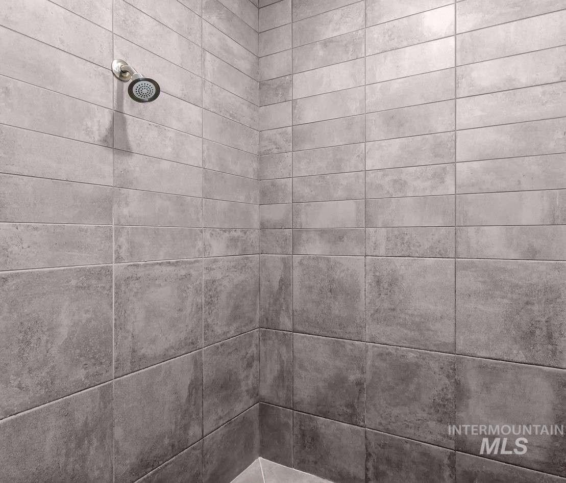 Bathroom view of tiled shower