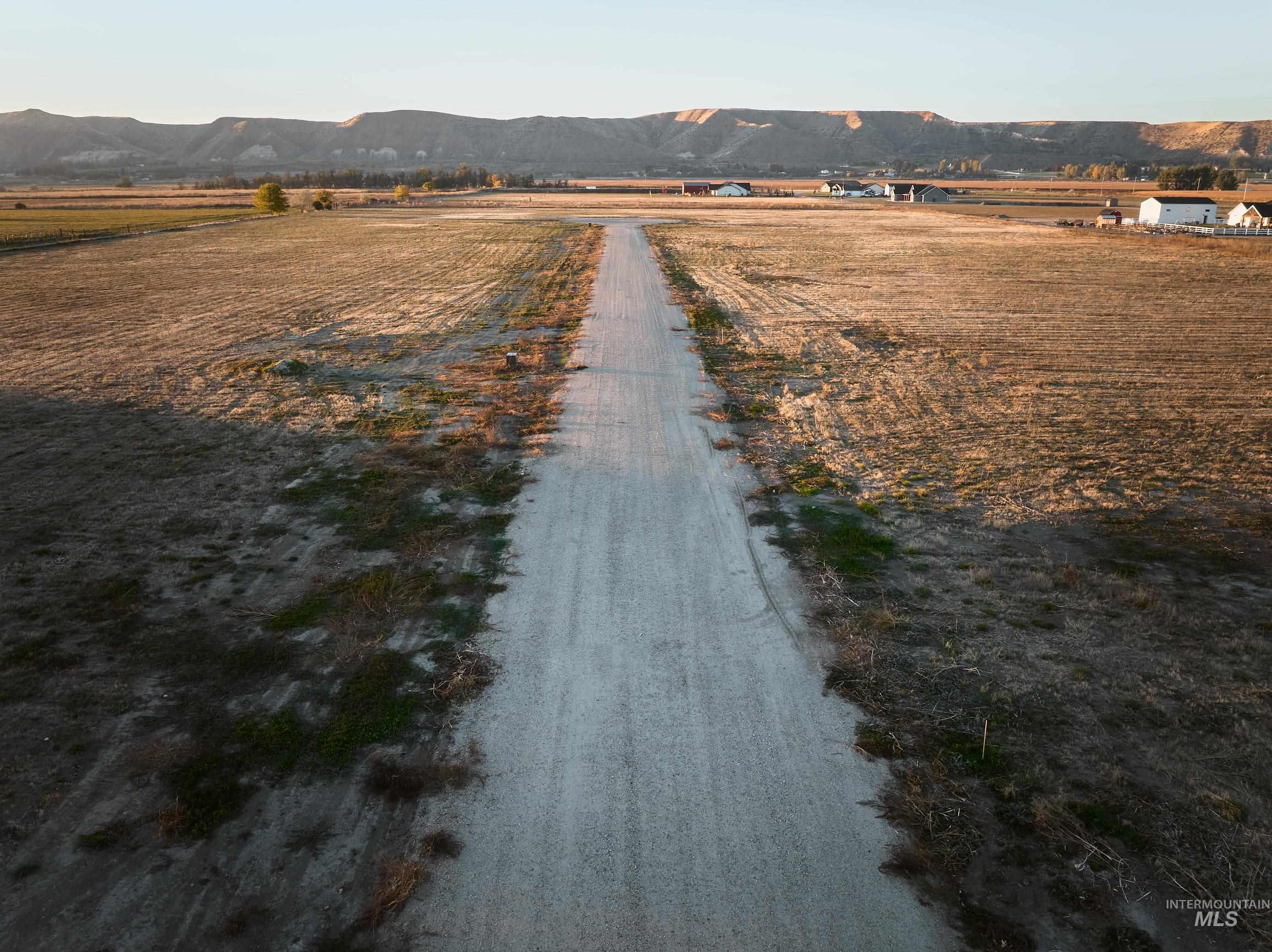 View of road featuring a mountain view and a view of countryside