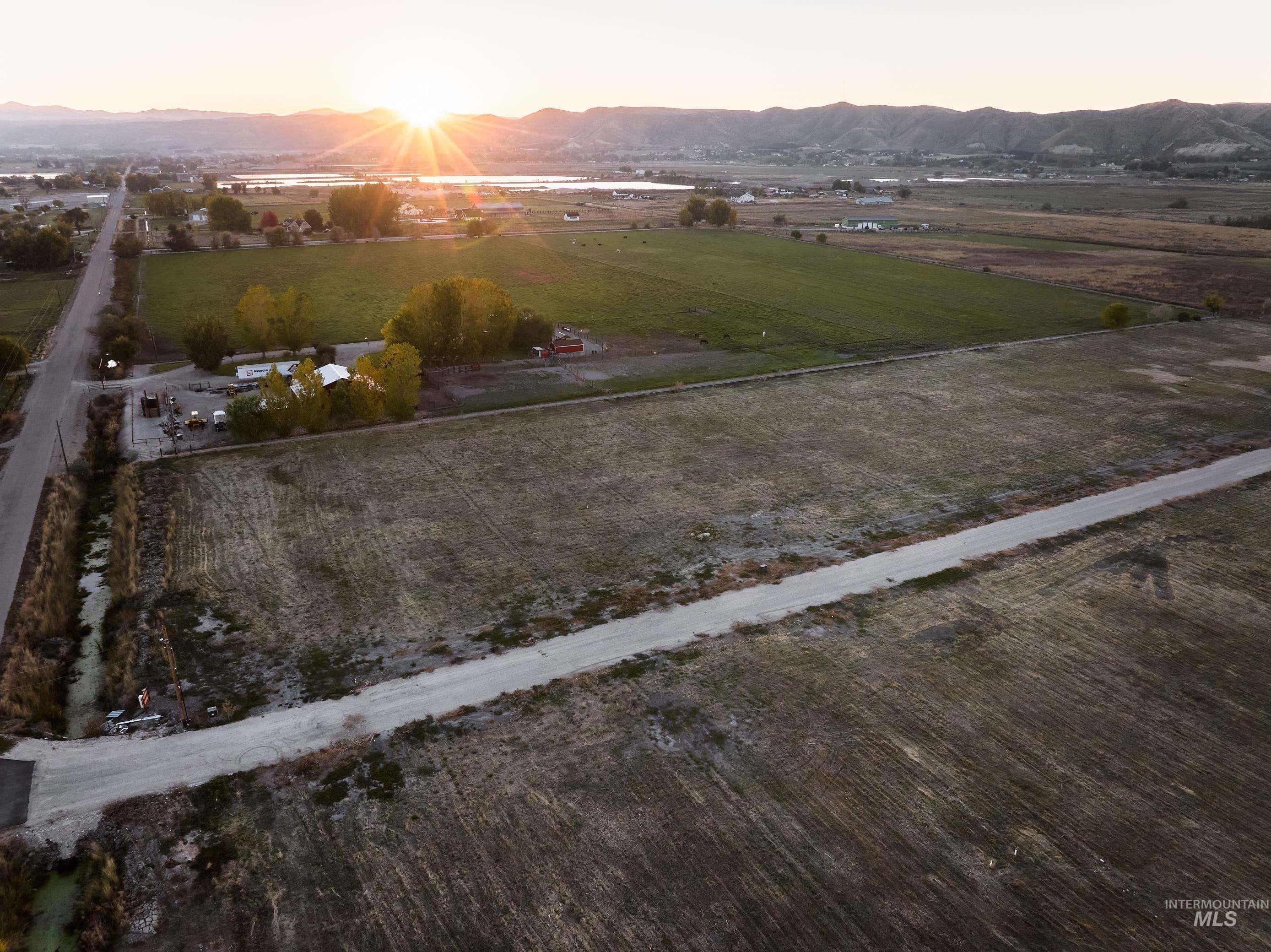 Aerial view at dusk of a view of countryside and a mountain view
