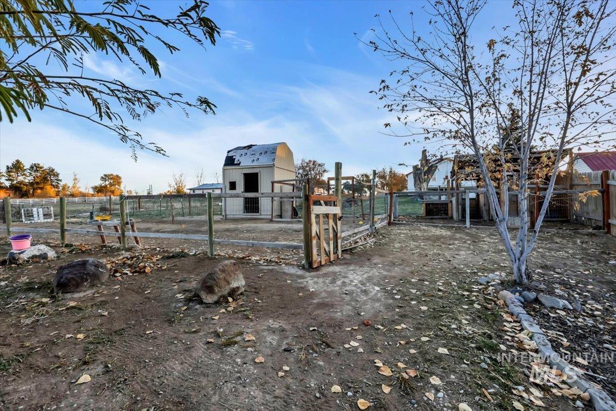 View of yard with an outbuilding